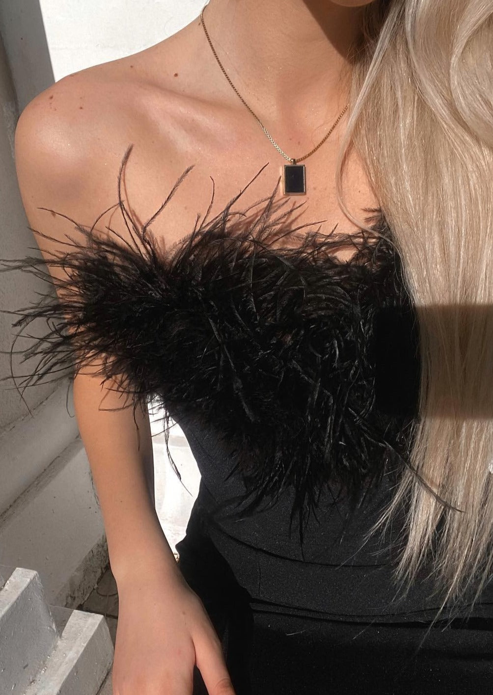 Fjolla – Feathered Elegance Strapless Gown